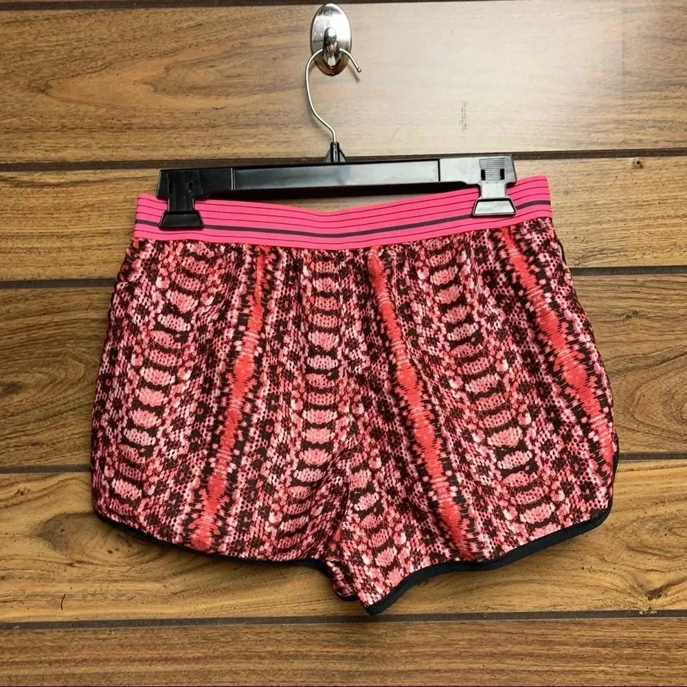 Under Armour pink running shorts size S heat gear